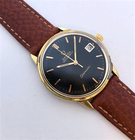 omega seamaster vintage gold plated|vintage omega seamaster day date.